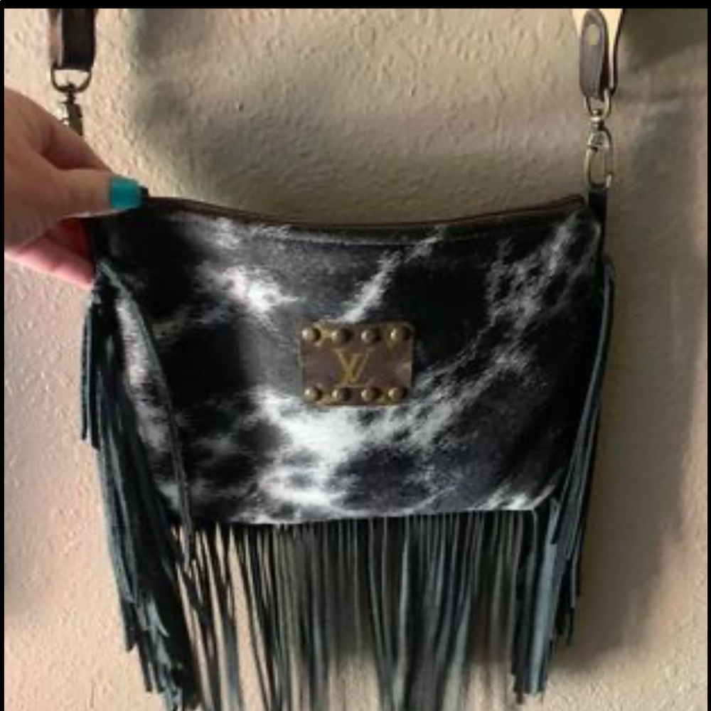 Keep it Gypsy cross body, Louis Vuitton full logo, hair on hid!
